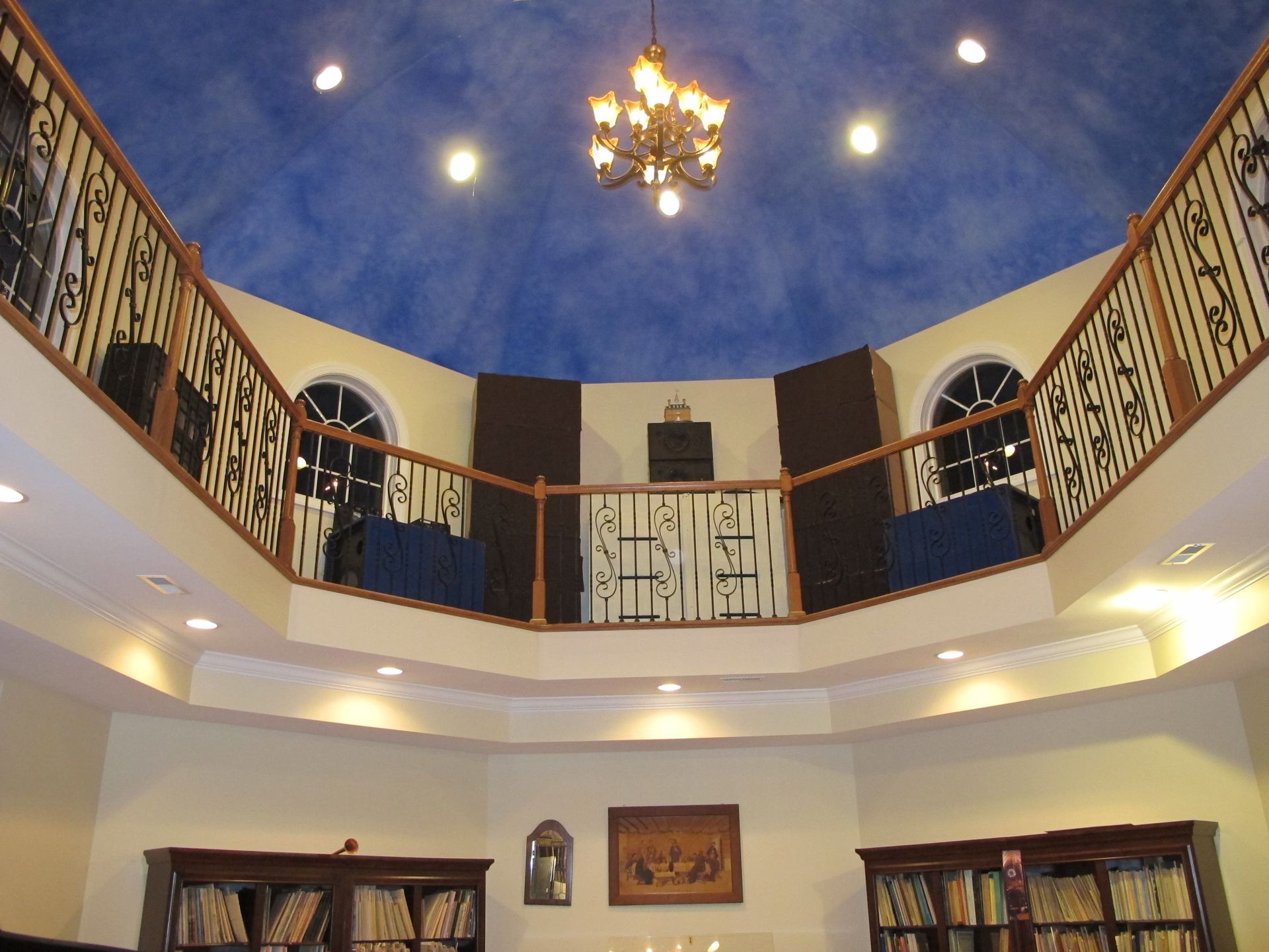 Music room addition with timber flooring and full-height windows