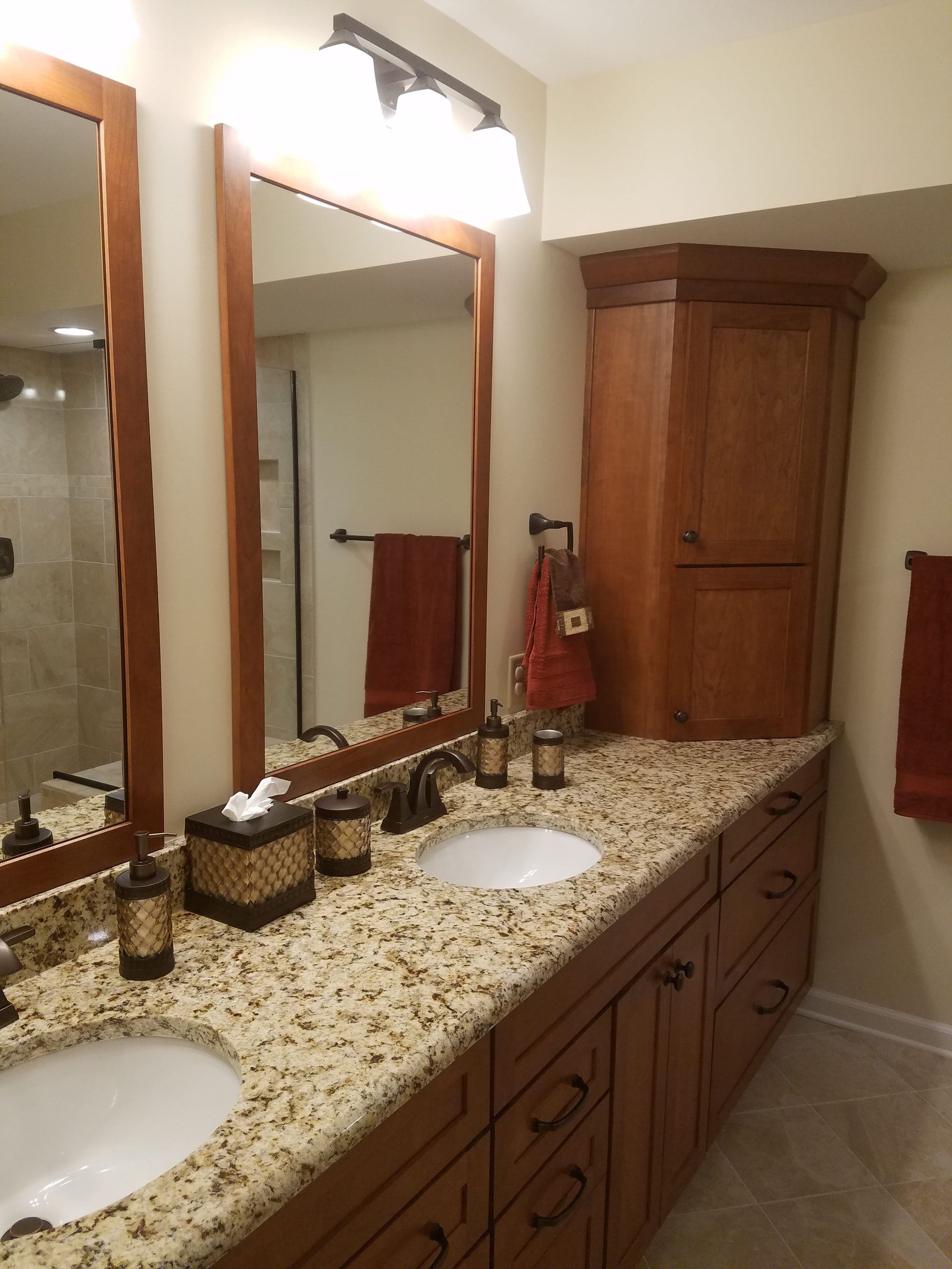 Remodeled bathroom with a tiled walk-in shower