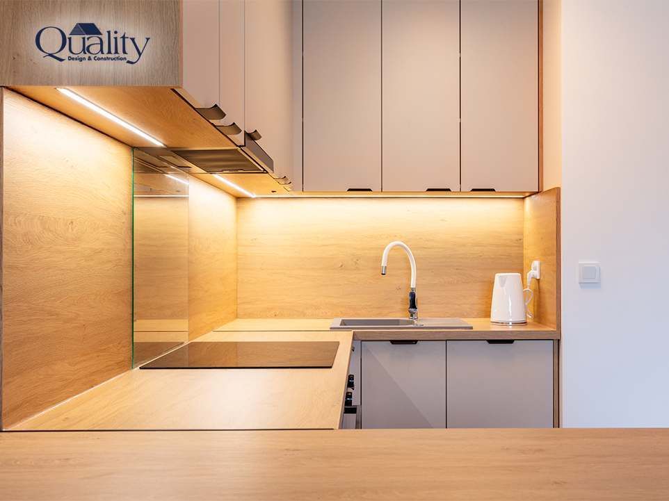 Under cabinet lighting illuminating a kitchen worktop